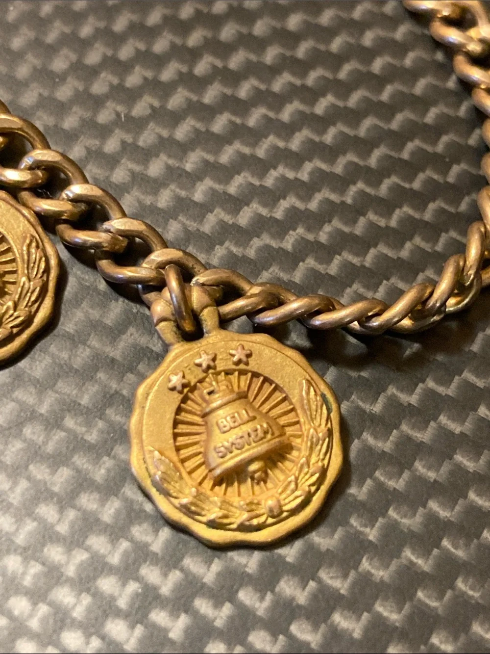 Gold Chain Bracelet marked 1/20 12K with Two 1/10 10K Medallion Charms